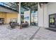 Stylish lobby area with comfortable seating, stone floors, high ceilings, and a modern aesthetic at 8612 Evening Dr, Sarasota, FL 34241