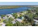 Waterfront home boasts tranquil water views, mature trees, and close proximity to the water at 1010 Tropical Dr, Bradenton, FL 34208