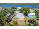 Charming waterfront property with well-maintained landscaping and serene river views at 1010 Tropical Dr, Bradenton, FL 34208