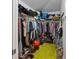 Walk-in closet with ample storage space for clothes, shoes, and accessories at 1010 Tropical Dr, Bradenton, FL 34208