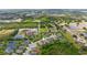 Aerial view of a peaceful neighborhood showcasing the surrounding landscape and community at 1034 Buttercup Gln, Bradenton, FL 34212