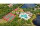 Community amenities include a pool, tennis courts, basketball court, playground, clubhouse, and pond at 1034 Buttercup Gln, Bradenton, FL 34212
