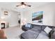 Comfortable living room with a large sectional sofa and neutral decor at 1034 Buttercup Gln, Bradenton, FL 34212