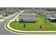 A view of the home's large, green backyard in a desirable, quiet neighborhood at 10464 Ladybug Cv, Parrish, FL 34219