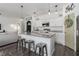 Modern kitchen with granite countertops, stainless steel appliances, and ample cabinet space at 10464 Ladybug Cv, Parrish, FL 34219