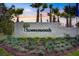 Community sign for Summerwoods, set amidst landscaped greenery at 10464 Ladybug Cv, Parrish, FL 34219