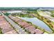 Expansive aerial view of a residential area with lakes, lush greenery, and convenient highway access at 11959 Tapestry Ln, Venice, FL 34293