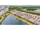 Scenic aerial view of homes in Primary planned community along beautiful waterway at 11959 Tapestry Ln, Venice, FL 34293