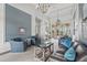 Warm and inviting community clubhouse lobby with comfortable seating and elegant decor at 11959 Tapestry Ln, Venice, FL 34293
