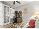 Bright home office with a desk, chair, and comfortable seating, perfect for remote work at 11959 Tapestry Ln, Venice, FL 34293