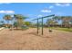 Fun community playground with shade covering and various play structures, ideal for entertainment at 11959 Tapestry Ln, Venice, FL 34293