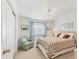 Bright bedroom with a comfortable seating area at 1404 44Th E Ave, Ellenton, FL 34222