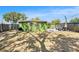 Expansive backyard with ample shade, featuring potential for landscaping and outdoor activities at 1417 14Th E St, Bradenton, FL 34208