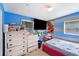 bedroom featuring colorful wall decor and ample dresser storage at 1417 14Th E St, Bradenton, FL 34208