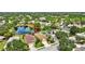 Overhead view of the home in a tranquil community overlooking a scenic pond at 14315 Tree Swallow Way, Lakewood Ranch, FL 34202