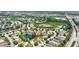 A peaceful community near a large pond provides beautiful views at 14315 Tree Swallow Way, Lakewood Ranch, FL 34202