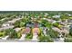 Beautiful aerial view of a residential home next to a tranquil lake at 14315 Tree Swallow Way, Lakewood Ranch, FL 34202