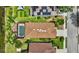 A bird's-eye view of a single-Gathering home with a pool and meticulously manicured landscaping at 14315 Tree Swallow Way, Lakewood Ranch, FL 34202
