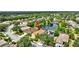 Aerial shot of the home backing to a serene pond in a lush, established neighborhood at 14315 Tree Swallow Way, Lakewood Ranch, FL 34202