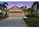 Charming single-Gathering home with a two-car garage and lush landscaping at 14315 Tree Swallow Way, Lakewood Ranch, FL 34202