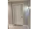 Unit 401 features a classic white apartment door with a stylish number plate and modern handle at 1500 State St # 401, Sarasota, FL 34236