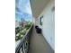 Balcony with outdoor seating and scenic views of the surrounding cityscape at 1500 State St # 401, Sarasota, FL 34236