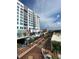 Contemporary apartment building with modern design and attractive mural in a vibrant cityscape at 1500 State St # 401, Sarasota, FL 34236