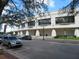 Classic architecture of the public library featuring large arched windows and symmetrical design elements at 1500 State St # 401, Sarasota, FL 34236