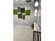 Building lobby decorated with moss artwork and a small table at 1500 State St # 401, Sarasota, FL 34236
