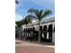 Attractive Hyde Park Prime Steakhouse featuring classic black awnings, lush landscaping, and inviting exterior at 1500 State St # 401, Sarasota, FL 34236