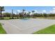Full basketball court with neatly maintained surfaces, providing a great place for sports and recreational activities at 17418 Blue Ridge Pl, Lakewood Ranch, FL 34211