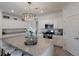 Bright kitchen showcases granite countertops, stainless appliances, and ample cabinet space at 17418 Blue Ridge Pl, Lakewood Ranch, FL 34211
