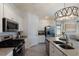 Stylish kitchen equipped with stainless steel appliances and granite countertops with plenty of storage at 17418 Blue Ridge Pl, Lakewood Ranch, FL 34211