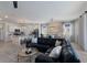 Bright living room with views of the kitchen and dining area at 17418 Blue Ridge Pl, Lakewood Ranch, FL 34211