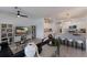 Comfortable living area with stylish decor and seamless access to the gourmet kitchen at 17418 Blue Ridge Pl, Lakewood Ranch, FL 34211