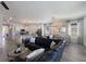 Open-concept living space featuring a modern kitchen, dining area, and comfortable living room at 17418 Blue Ridge Pl, Lakewood Ranch, FL 34211