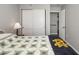 Cozy bedroom with closet featuring wood laminate flooring at 2008 Canal Dr # M3, Bradenton, FL 34207