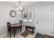 Cozy entryway with table and chair set, complete with a hall bench at 2008 Canal Dr # M3, Bradenton, FL 34207