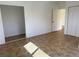Bedroom with tile flooring, closet, and neutral walls, ready for personalization and comfortable living at 22343 Lasalle Rd, Port Charlotte, FL 33952