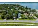 Charming two-story home nestled among mature trees and lush green landscaping in a waterfront community at 3405 10Th W St, Palmetto, FL 34221