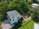 Beautiful two-story home with lush landscaping, mature trees, and a fenced in backyard at 3405 10Th W St, Palmetto, FL 34221