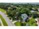 Charming two-story home nestled among mature trees and lush green landscaping in a waterfront community at 3405 10Th W St, Palmetto, FL 34221