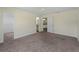 Spacious bedroom with plush carpeting and access to a bathroom and closet at 3405 10Th W St, Palmetto, FL 34221