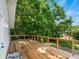 Spacious wooden deck with lush greenery, perfect for outdoor entertaining at 3405 10Th W St, Palmetto, FL 34221