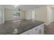 Open-concept kitchen featuring granite countertops and stainless steel appliances at 3405 10Th W St, Palmetto, FL 34221