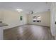 Open-concept living area with wood floors and lots of natural light at 3405 10Th W St, Palmetto, FL 34221
