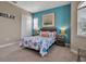 Comfortable bedroom featuring soft carpet, complemented by an ocean-themed motif and natural light at 436 Canal Rd # A, Sarasota, FL 34242