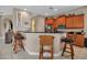 Well-designed kitchen with a granite countertop bar area and seating for casual dining, perfect for entertaining guests at 436 Canal Rd # A, Sarasota, FL 34242