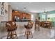 Spacious kitchen featuring a breakfast bar, stainless appliances, and a dining area with stylish, comfortable seating at 436 Canal Rd # A, Sarasota, FL 34242