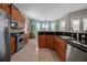 Charming kitchen featuring granite countertops, stainless appliances, and a breakfast nook, perfect for casual dining at 436 Canal Rd # A, Sarasota, FL 34242